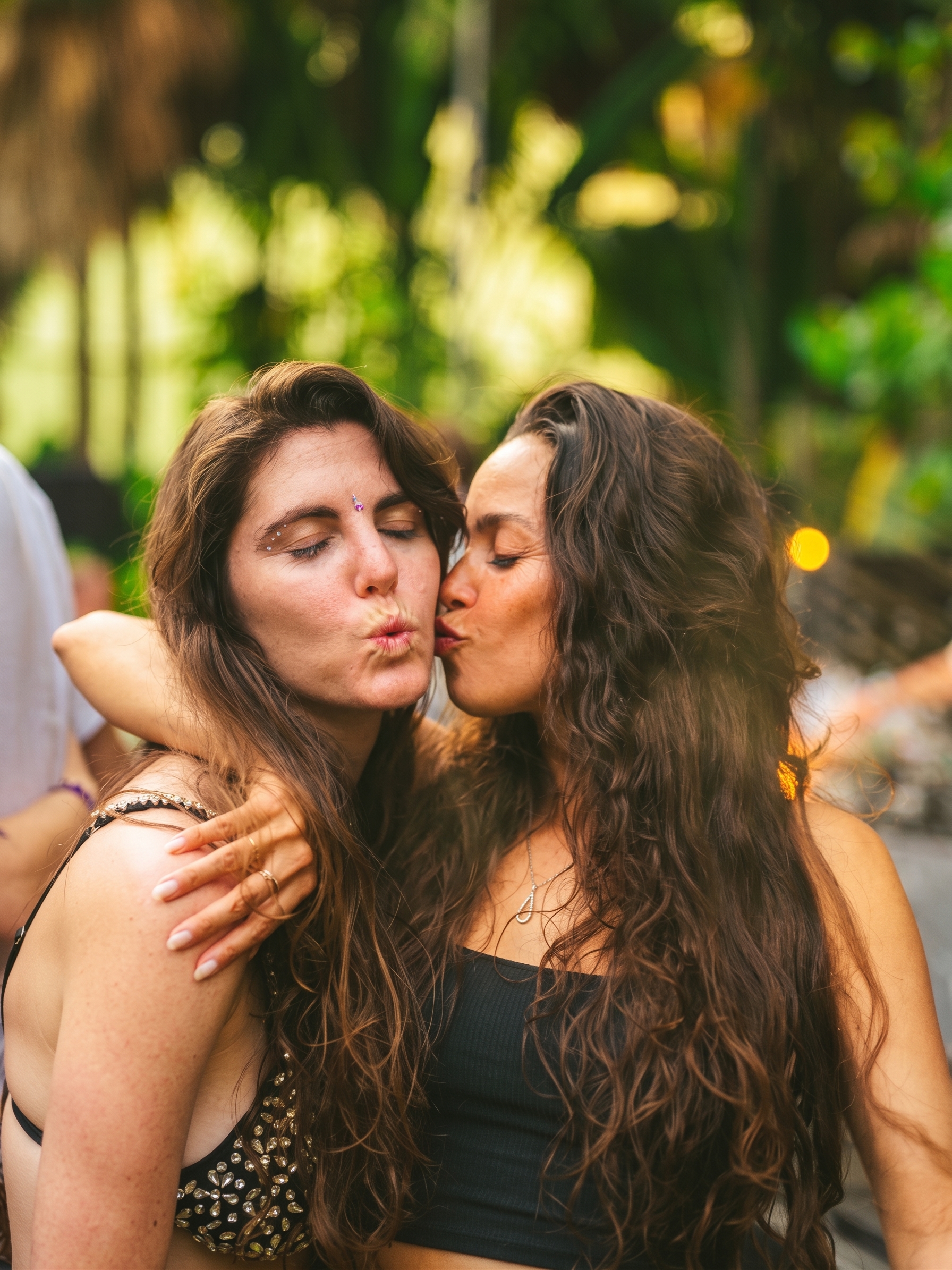 Two friends sharing a kiss on the Season 1 dance floor